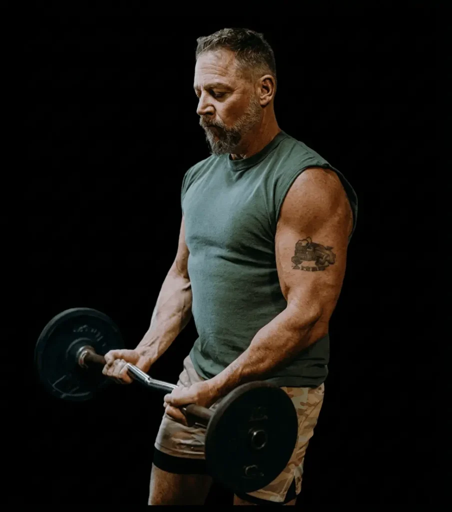 Iron Rooster Fitness coach demonstrating a strong and disciplined approach to fitness